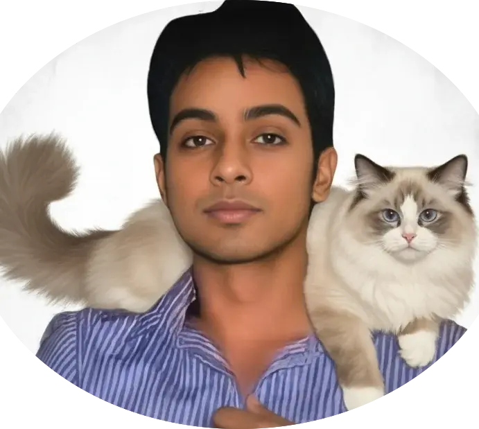 Chiranjeev Thomas with his Ragdoll cat resting on his shoulder